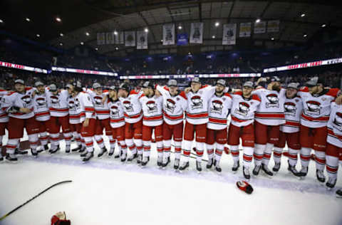 ROSEMONT, ILLINOIS – JUNE 08: Members of the Charlotte Checkers wait their turn to hoist the Calder Cup after game Five of the Calder Cup Finals at Allstate Arena on June 08, 2019 in Rosemont, Illinois. The Checkers defeated the Wolves 5-3 to win the Calder Cup. (Photo by Jonathan Daniel/Getty Images)