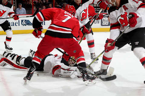 RALEIGH, NC – MARCH 2: Keith Kinkaid #1 of the New Jersey Devils goes down inn the crease to make a save on a shot by Derek Ryan #7 of the Carolina Hurricanes during an NHL game on March 2, 2018 at PNC Arena in Raleigh, North Carolina. (Photo by Gregg Forwerck/NHLI via Getty Images)