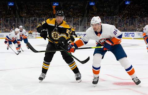 BOSTON, MA – MAY 29: Nick Ritchie #21 of the Boston Bruins checks Scott Mayfield #24 of the New York Islanders  (Photo by Rich Gagnon/Getty Images)