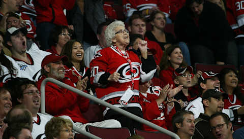 RALEIGH, NC – OCTOBER 10: Hurricane fan Dancing Granny celebrates a Carolina goal during an NHL game between the Carolina Hurricanes and the Florida Panthers on October 10, 2008 at RBC Center in Raleigh, North Carolina. (Photo by Gregg Forwerck/NHLI via Getty Images)