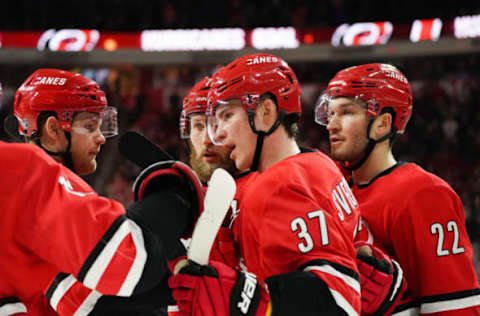 RALEIGH, NC – JANUARY 05: Carolina Hurricanes Left Wing Andrei Svechnikov (37) is congratulated after scoring in the third period during a game between the Tampa Bay Lightning and the Carolina Hurricanes on January 5, 2020 at the PNC Arena in Raleigh, NC. (Photo by Greg Thompson/Icon Sportswire via Getty Images)