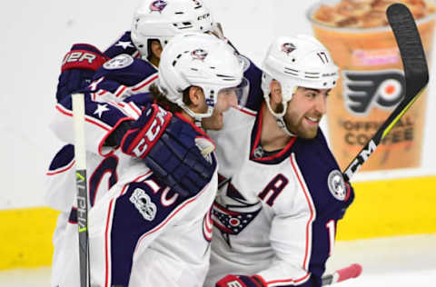 Mar 13, 2017; Philadelphia, PA, USA; Columbus Blue Jackets center Brandon Dubinsky (17) celebrates his goal with defenseman Seth Jones (3) and left wing Brandon Saad (20) against the Philadelphia Flyers during the third period at Wells Fargo Center. The Blue Jackets defeated the Flyers, 5-3. Mandatory Credit: Eric Hartline-USA TODAY Sports