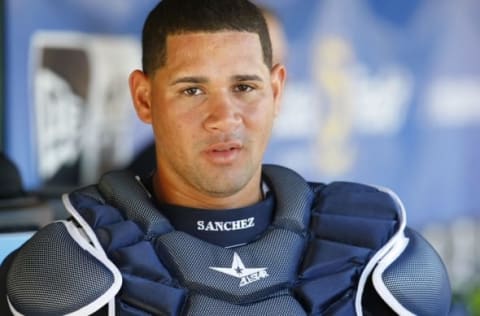 Mar 6, 2016; Clearwater, FL, USA; New York Yankees catcher Garry Sanchez (72) looks on in the dugout against the Philadelphia Phillies at Bright House Field. Mandatory Credit: Kim Klement-USA TODAY Sports