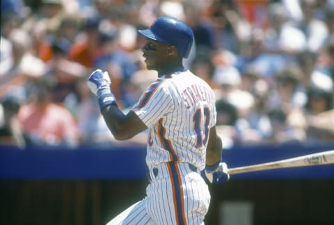 NEW YORK – CIRCA 1984: Darryl Strawberry #18 of the New York Mets bats during a Major League Baseball game circa 1984 at Shea Stadium in the Queens borough of New York City. Strawberry played for the Mets from 1983-90. (Photo by Focus on Sport/Getty Images)