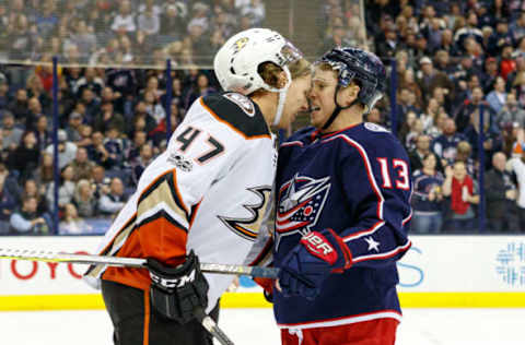 COLUMBUS, OH – DECEMBER 01: Anaheim Ducks’ Hampus Lindholm (47) headbutts Columbus Blue Jackets right wing Cam Atkinson (13). (Photo by Adam Lacy/Icon Sportswire via Getty Images)