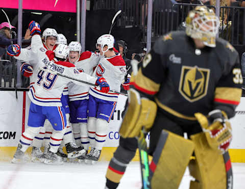 LAS VEGAS, NEVADA – OCTOBER 30: The Montreal Canadiens celebrate a third-period goal by Nick Suzuki #14 against Adin Hill #33 of the Vegas Golden Knights during their game at T-Mobile Arena on October 30, 2023 in Las Vegas, Nevada. The Golden Knights defeated the Canadiens 3-2 in a shootout. (Photo by Ethan Miller/Getty Images)