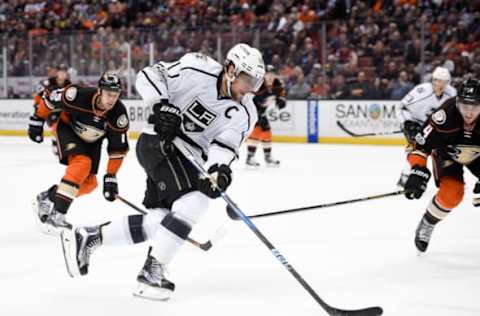 Feb 19, 2017; Anaheim, CA, USA; Los Angeles Kings center Anze Kopitar (11) moves the puck against the Anaheim Ducks during the first period at Honda Center. Mandatory Credit: Kelvin Kuo-USA TODAY Sports