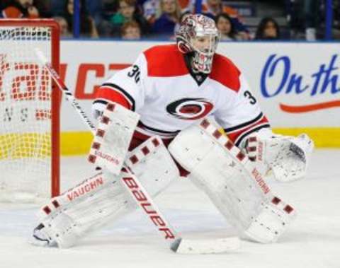 Jan 4, 2016; Edmonton, Alberta, CAN; Carolina Hurricanes goaltender Cam Ward (30) follows the play against the Edmonton Oilers at Rexall Place. Mandatory Credit: Perry Nelson-USA TODAY Sports