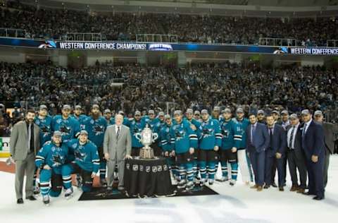 May 25, 2016; San Jose, CA, USA; The San Jose Sharks stand with the Clarence S. Campbell Bowl after defeating the St. Louis Blues 5-2 to win the Western Conference Finals of the 2016 Stanley Cup Playoffs at SAP Center at San Jose. Mandatory Credit: Kelley L Cox-USA TODAY Sports