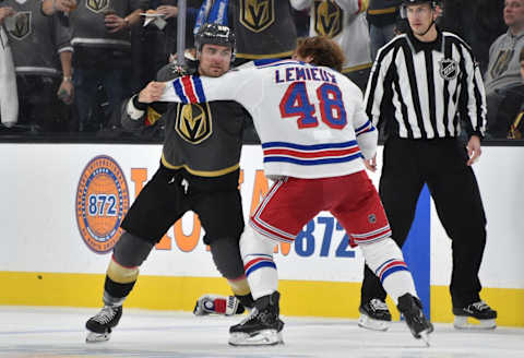 William Carrier #28 of the Vegas Golden Knights fights Brendan Lemieux #48 of the New York Rangers