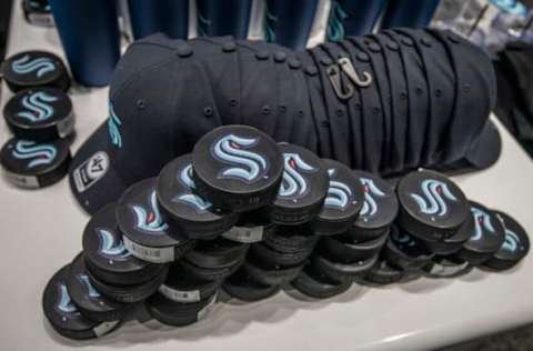 SEATTLE, WASHINGTON – AUGUST 21: Pucks advertise the NHL’s newest franchise during the grand opening of Seattle Kraken Team Store on August 21, 2020 in Seattle, Washington. (Photo by Jim Bennett/Getty Images)