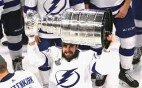 EDMONTON, ALBERTA – SEPTEMBER 28: Cedric Paquette #13 of the Tampa Bay Lightning skates with the Stanley Cup following the series-winning victory over the Dallas Stars in Game Six of the 2020 NHL Stanley Cup Final at Rogers Place on September 28, 2020 in Edmonton, Alberta, Canada. (Photo by Bruce Bennett/Getty Images)