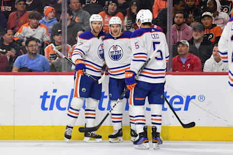 Oct 19, 2023; Philadelphia, Pennsylvania, USA; Edmonton Oilers left wing Zach Hyman (18) celebrates his goal with center Connor McDavid (97) and defenseman Cody Ceci (5) against the Philadelphia Flyers during the second period at Wells Fargo Center. Mandatory Credit: Eric Hartline-USA TODAY Sports