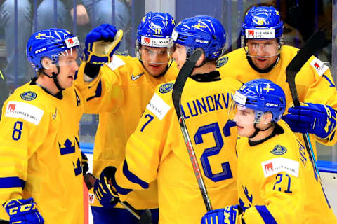 Swedish players celebrate a goal scored against the Czech Republic