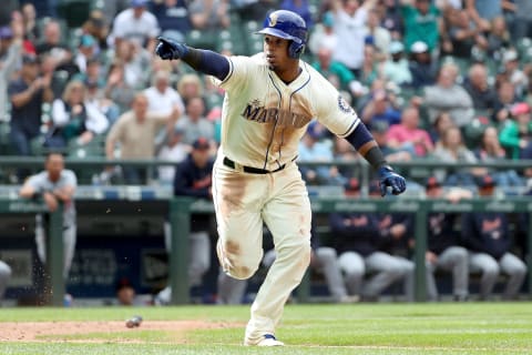 SEATTLE, WA – MAY 20: Jean Segura #2 celebrates of the Seattle Mariners points to the dugout after hitting a walk off single to defeat the Detroit Tigers 3-2 in the eleventh inning during their game at Safeco Field on May 20, 2018 in Seattle, Washington. (Photo by Abbie Parr/Getty Images)