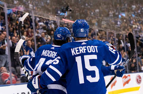 TORONTO, ON – OCTOBER 5: Trevor Moore #42 of the Toronto Maple Leafs celebrates his goal against the Montreal Canadiens with teammate Alexander Kerfoot #15. (Photo by Kevin Sousa/NHLI via Getty Images)