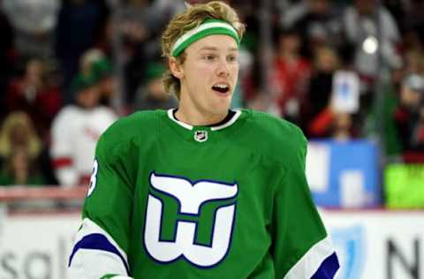 RALEIGH, NC – JANUARY 11: Ryan Dzingel #18 of the Carolina Hurricanes warms up during pregame on Whalers’ night prior to an NHL game against the Los Angeles Kings on January 11, 2020 at PNC Arena in Raleigh, North Carolina. (Photo by Gregg Forwerck/NHLI via Getty Images)