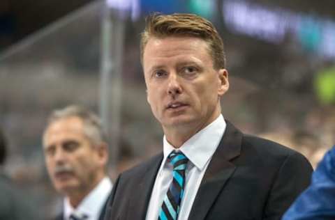 Oct 21, 2014; Dallas, TX, USA; Vancouver Canucks assistant coach Glen Gulutzan during the game against the Dallas Stars at the American Airlines Center. The Stars defeated the Canucks 6-3. Mandatory Credit: Jerome Miron-USA TODAY Sports