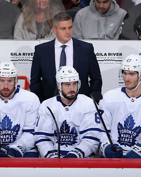 GLENDALE, ARIZONA - NOVEMBER 21: Head coach Sheldon Keefe of the Toronto Maple Leafs watches from the bench during the first period of the NHL game against the Arizona Coyotes at Gila River Arena on November 21, 2019 in Glendale, Arizona. (Photo by Christian Petersen/Getty Images)