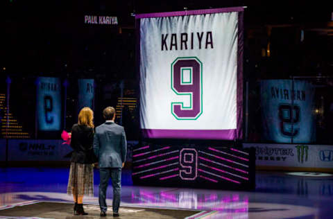 ANAHEIM, CA – OCTOBER 21: Former Anaheim Duck Paul Kariya and his partner Valerie Dawson watch as the banner gets raised during his jersey retirement ceremony prior to the game against the Buffalo Sabres on October 21, 2018, at Honda Center in Anaheim, California. (Photo by Debora Robinson/NHLI via Getty Images)