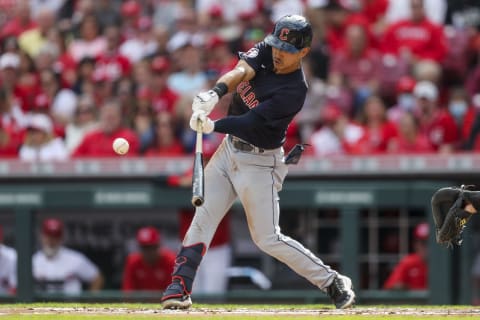 Apr 12, 2022; Cincinnati, Ohio, USA; Cleveland Guardians left fielder Steven Kwan (38) bats a RBI single against the Cincinnati Reds in the third inning at Great American Ball Park. Mandatory Credit: Katie Stratman-USA TODAY Sports