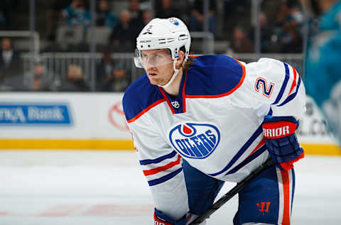 SAN JOSE, CA – APRIL 1: Jeff Petry #2 of the Edmonton Oilers in a faceoff against the San Jose Sharks at SAP Center on April 1, 2014 in San Jose, California. (Photo by Rocky Widner/Getty Image)