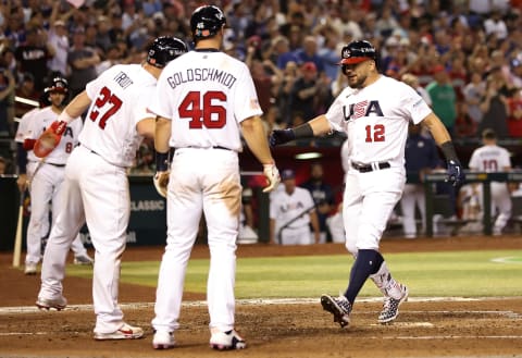 Kyle Schwarber celebrates his three-run home run. (Photo by Christian Petersen/Getty Images)