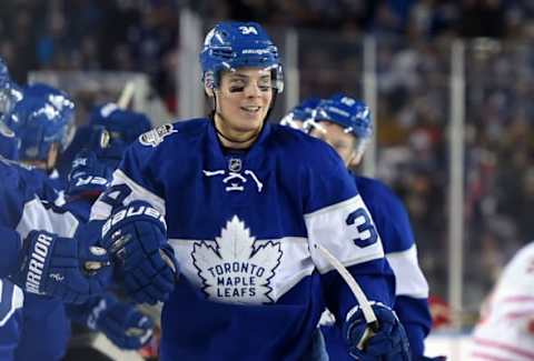 Jan 1, 2017; Toronto, Ontario, CAN; Toronto Maple Leafs forward Auston Matthews (34) celebrates with teammates after scoring against Detroit Red Wings during the Centennial Classic ice hockey game at BMO Field. Mandatory Credit: Dan Hamilton-USA TODAY Sports