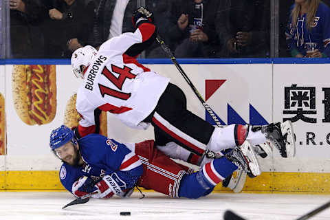 May 9, 2017; New York, NY, USA; Ottawa Senators left wing Alex Burrows (14) falls on top of New York Rangers center Derek Stepan (21) during the third period of game six of the second round of the 2017 Stanley Cup Playoffs at Madison Square Garden. Mandatory Credit: Brad Penner-USA TODAY Sports