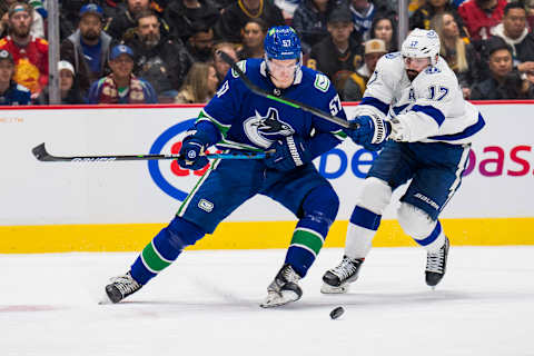 Mar 13, 2022; Vancouver, British Columbia, CAN; Tampa Bay Lightning forward Alex Killorn (17) stick checks Vancouver Canucks defenseman Tyler Myers (57) in the second period at Rogers Arena. Mandatory Credit: Bob Frid-USA TODAY Sports