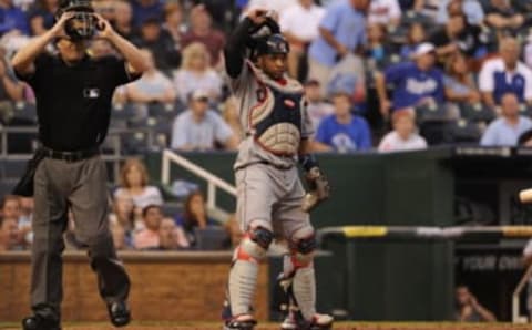 KANSAS CITY, MO – SEPTEMBER 3: Catcher Carlos Santana #41 of the Cleveland Indians looks at the play in the field as the ball is put into play in the game against the Kansas City Royals on September 3, 2011 at Kauffman Stadium in Kansas City, Missouri. The Kansas City Royals defeated the Cleveland Indians 5-1. (Photo by John Williamson/MLB Photos via Getty Images)