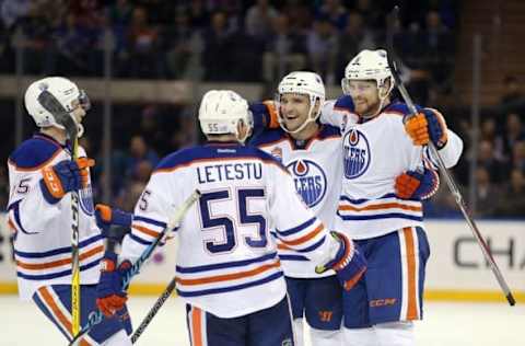 Nov 3, 2016; New York, NY, USA; Edmonton Oilers defenseman Adam Larsson (6) celebrates his goal against the New York Rangers with teammates during the third period at Madison Square Garden. Mandatory Credit: Brad Penner-USA TODAY Sports