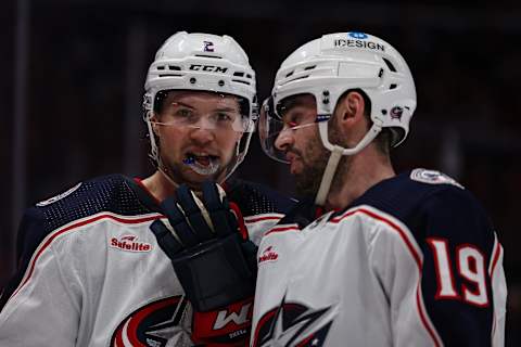 WASHINGTON, DC – JANUARY 08: Andrew Peeke #2 and Liam Foudy #19 of the Columbus Blue Jackets interact during the second period of the game against the Washington Capitals at Capital One Arena on January 8, 2023 in Washington, DC. (Photo by Scott Taetsch/Getty Images)