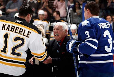 TORONTO, CANADA – MARCH 19: Howie Meeker shakes Tomas Kaberle #12   (Photo by Abelimages/Getty Images)