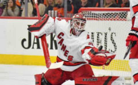 Mar 5, 2020; Philadelphia, Pennsylvania, USA; Carolina Hurricanes goaltender Alex Nedeljkovic (39) makes a glove save against the Philadelphia Flyers during the second period at Wells Fargo Center. Mandatory Credit: Eric Hartline-USA TODAY Sports