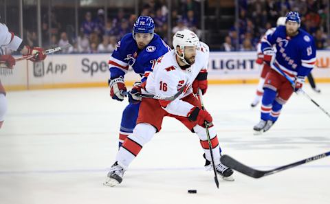 May 22, 2022; New York, New York, USA; Carolina Hurricanes center Vincent Trocheck (16) skates ahead of New York Rangers center Filip Chytil (72) during the third period in game three of the second round of the 2022 Stanley Cup Playoffs at Madison Square Garden. Mandatory Credit: Danny Wild-USA TODAY Sports