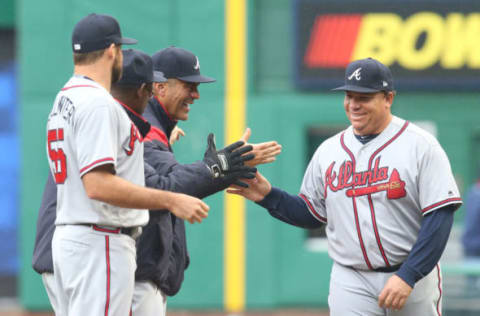 Apr 7, 2017; Pittsburgh, PA, USA; Atlanta Braves pitcher Bartolo Colon (R) greets teammates before playing the Pittsburgh Pirates in the 2017 season opening home game at PNC Park. The Pirates won 5-4. Mandatory Credit: Charles LeClaire-USA TODAY Sports