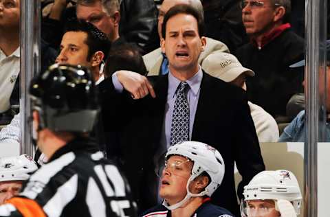 PITTSBURGH, PA - FEBRUARY 8: Head Coach Scott Arniel of the Columbus Blue Jackets talks with a referee during a game against the Pittsburgh Penguins on February 8, 2011 at CONSOL Energy Center in Pittsburgh, Pennsylvania. (Photo by Jamie Sabau/Getty Images)