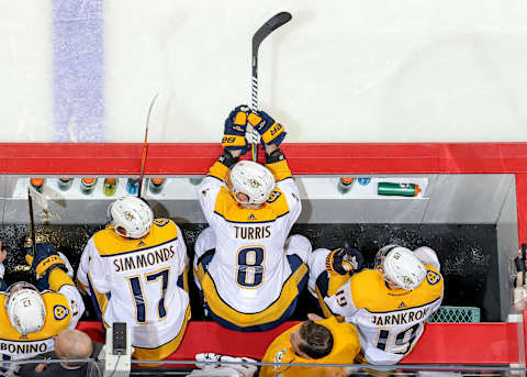 WINNIPEG, MB – MARCH 1: Wayne Simmonds #17, Kyle Turris #8 and Calle Jarnkrok #19 of the Nashville Predators look on from the bench during second period action against the Winnipeg Jets at the Bell MTS Place on March 1, 2019 in Winnipeg, Manitoba, Canada. The Jets defeated the Preds 5-3. (Photo by Jonathan Kozub/NHLI via Getty Images)