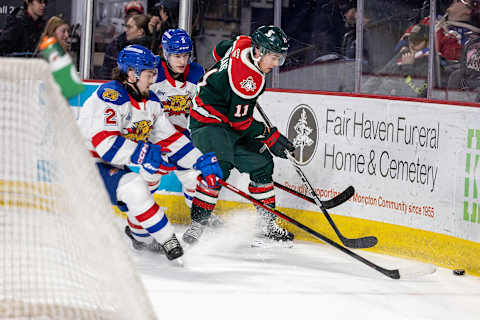 MONCTON, NB – MARCH 12:Anthony Hamel #2 and Etienne Morin #5 of Moncton Wildcats defend against Jordan Dumais #11 of Halifax Mooseheads during first period at Avenir Centre on March 12, 2023 in Moncton, Canada. (Photo by Dale Preston/Getty Images)