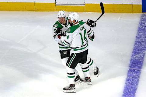 John Klingberg #3 of the Dallas Stars is congratulated by Jamie Benn #14 (Photo by Bruce Bennett/Getty Images)