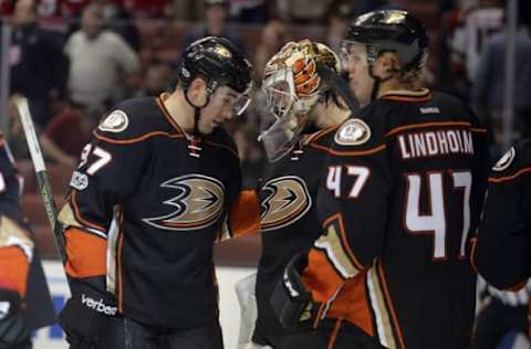 NHL Power Rankings: Anaheim Ducks left wing Nick Ritchie (37) celerbates with goalie John Gibson (36) and defenseman Hampus Lindholm (47) the 2-0 victory against the Detroit Red Wings at Honda Center. Mandatory Credit: Gary A. Vasquez-USA TODAY Sports