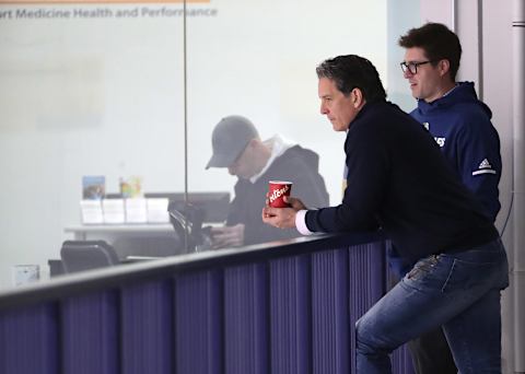 TORONTO, ON- APRIL 16 - Brendan Shanahan and Kyle Dubas chat was they watch the Toronto Maple Leafs practice before game four against the Boston Bruins in their first round play-off series in Toronto. April 16, 2019. (Steve Russell/Toronto Star via Getty Images)