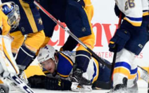 Nashville Predators take St. Louis Blues right wing Vladimir Tarasenko (91) to the ice (Christopher Hanewinckel-USA TODAY Sports)