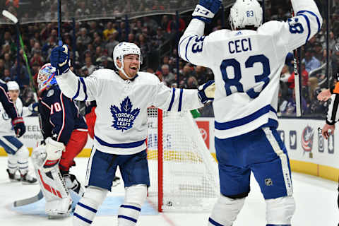 COLUMBUS, OH - OCTOBER 4: Andreas Johnsson #18 of the Toronto Maple Leafs reacts after Cody Ceci #83 of the Toronto Maple Leafs scores a goal during the second period in a game against the Columbus Blue Jackets on October 4, 2019 at Nationwide Arena in Columbus, Ohio. (Photo by Jamie Sabau/NHLI via Getty Images)