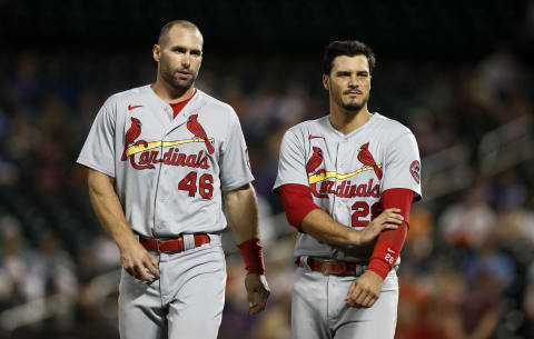 NEW YORK, NEW YORK – SEPTEMBER 14: Paul Goldschmidt #46 and Nolan Arenado #28 of the St. Louis Cardinals look on after the first inning against the New York Mets at Citi Field on September 14, 2021 in New York City. The Cardinals defeated the Mets 7-6 in eleven innings. (Photo by Jim McIsaac/Getty Images)