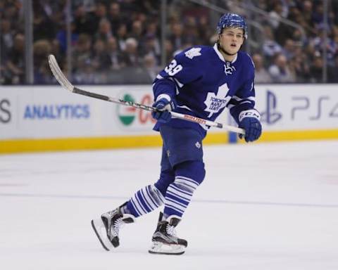 Mar 9, 2016; Toronto, Ontario, CAN; Toronto Maple Leafs forward William Nylander (39) skates against the New York Islanders during the second period at the Air Canada Centre. Mandatory Credit: John E. Sokolowski-USA TODAY Sports