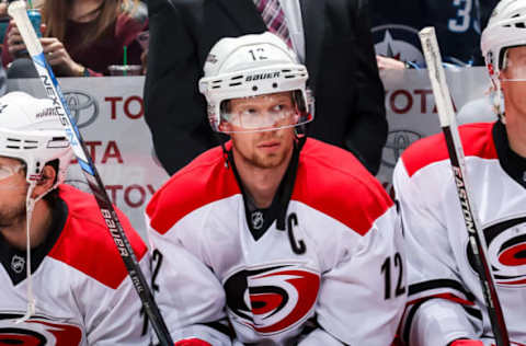 WINNIPEG, MB – FEBRUARY 5: Eric Staal #12 of the Carolina Hurricanes looks on from the bench prior to puck drop against the Winnipeg Jets at the MTS Centre on February 5, 2016 in Winnipeg, Manitoba, Canada. (Photo by Jonathan Kozub/NHLI via Getty Images)