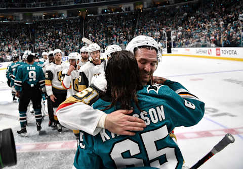 SAN JOSE, CA – APRIL 23: Erik Karlsson #65 of the San Jose Sharks embraces with Mark Stone #61 of the Vegas Golden Knights in Game Seven of the Western Conference First Round during the 2019 NHL Stanley Cup Playoffs at SAP Center on April 23, 2019 in San Jose, California (Photo by Brandon Magnus/NHLI via Getty Images)