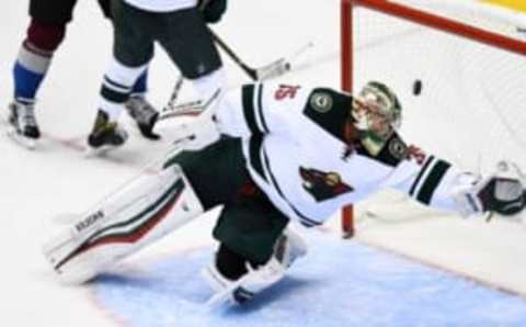 Oct 4, 2016; Denver, CO, USA; Minnesota Wild goalie Darcy Kuemper (35) is unable to make a save on a shot by Colorado Avalanche defenseman Chris Bigras (3) (not pictured) in the second period during a preseason hockey game at the Pepsi Center. Mandatory Credit: Ron Chenoy-USA TODAY Sports